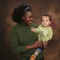 Linda Bazalaki with her child